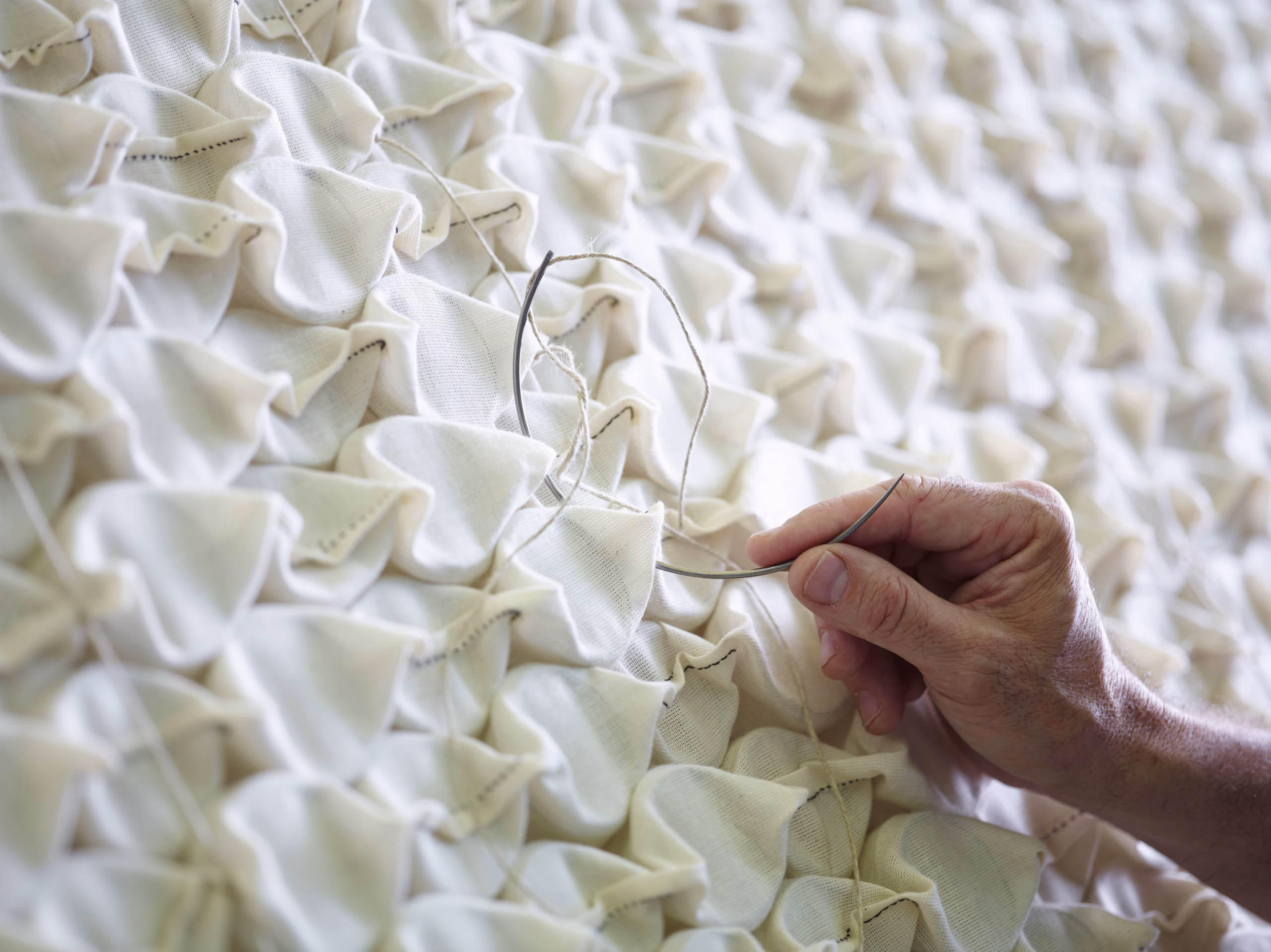 Hand nesting mattress